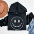 Introducing the latest in outdoor fashion and forest friendliness: the "Tree-mendous Smiles Hoodie"! This isn't just any hoodie; it's your ticket to becoming the most smiley face in the wild. With a dazzling happy face emblazoned on the front, you're set to spread joy among the trees, the birds, and even the most stubborn of rocks.